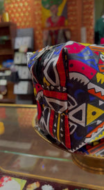 Last inn og spill av video i Gallerivisningen, Toalettmappe liten - red graphic
