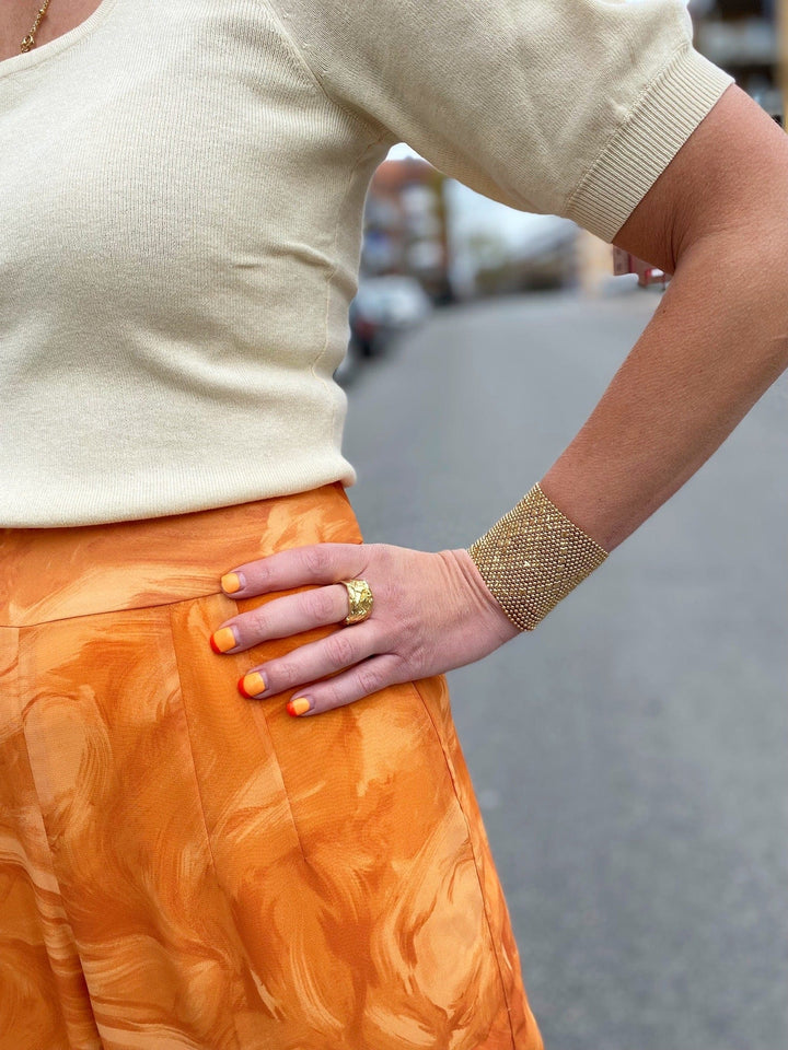 Kule culottes bukser i marmorert orange fra Dianas Vintage. Vide ben og bred linning.